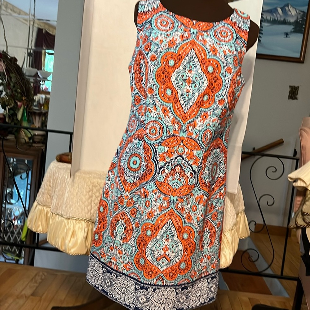 Multi color dress great for summer or fall with a jacket.
